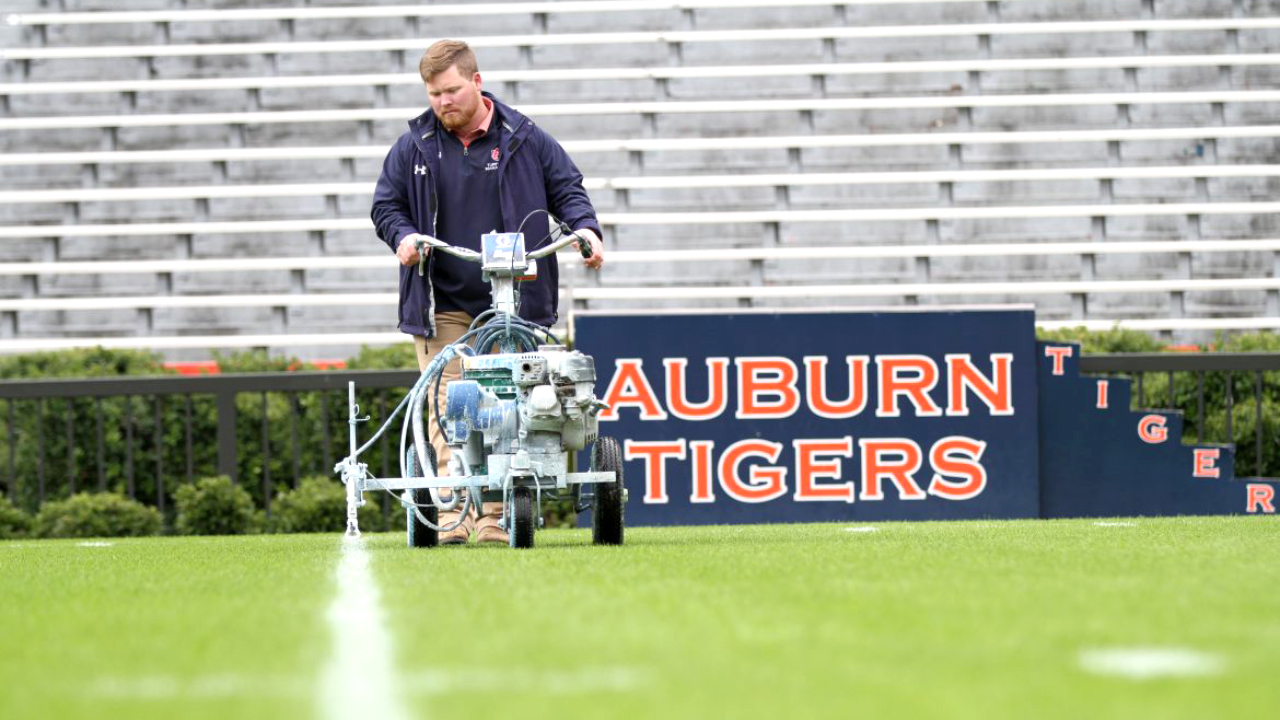 Wilson Morgan prepares Auburn Tigers football field (pitch) at Jordan Hare stadium in Alabama.