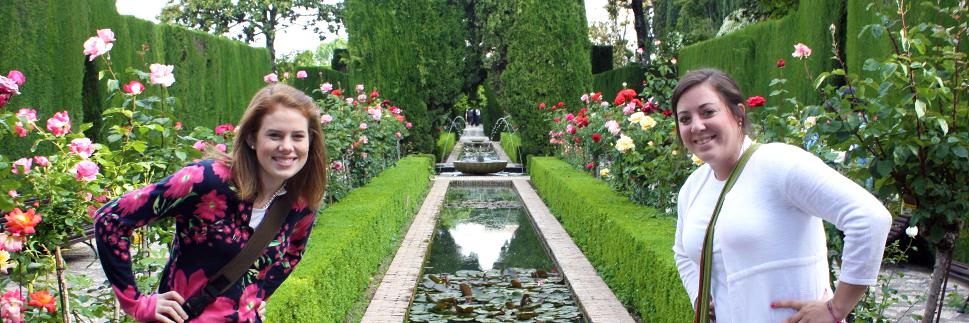 Auburn Landscape Horticulture Majors, 2 Female College Students, Hort Club, Study Abroad in Spain, Flowers and Green Shrubs, trimmed estate bushes, water fountain, irrigation, design