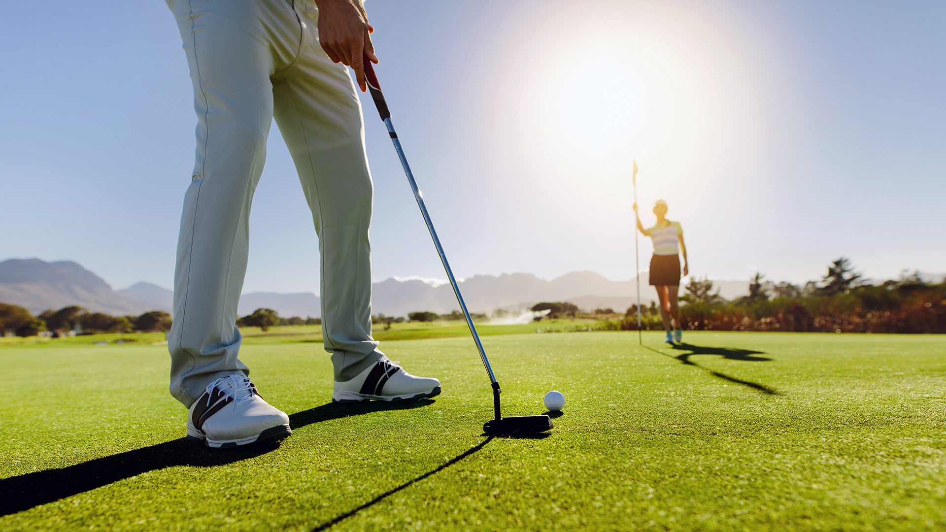 Golfers-Putt-Golf-Ball-on-Green-Course-Auburn-Turfgrass-Management-Major-Degree-Option CSES