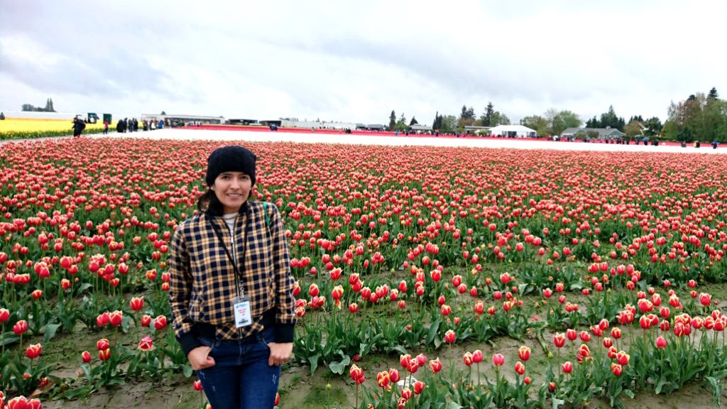 Adriana-Cifuentes-Carvajal-in-flower-farm-field-Columbia