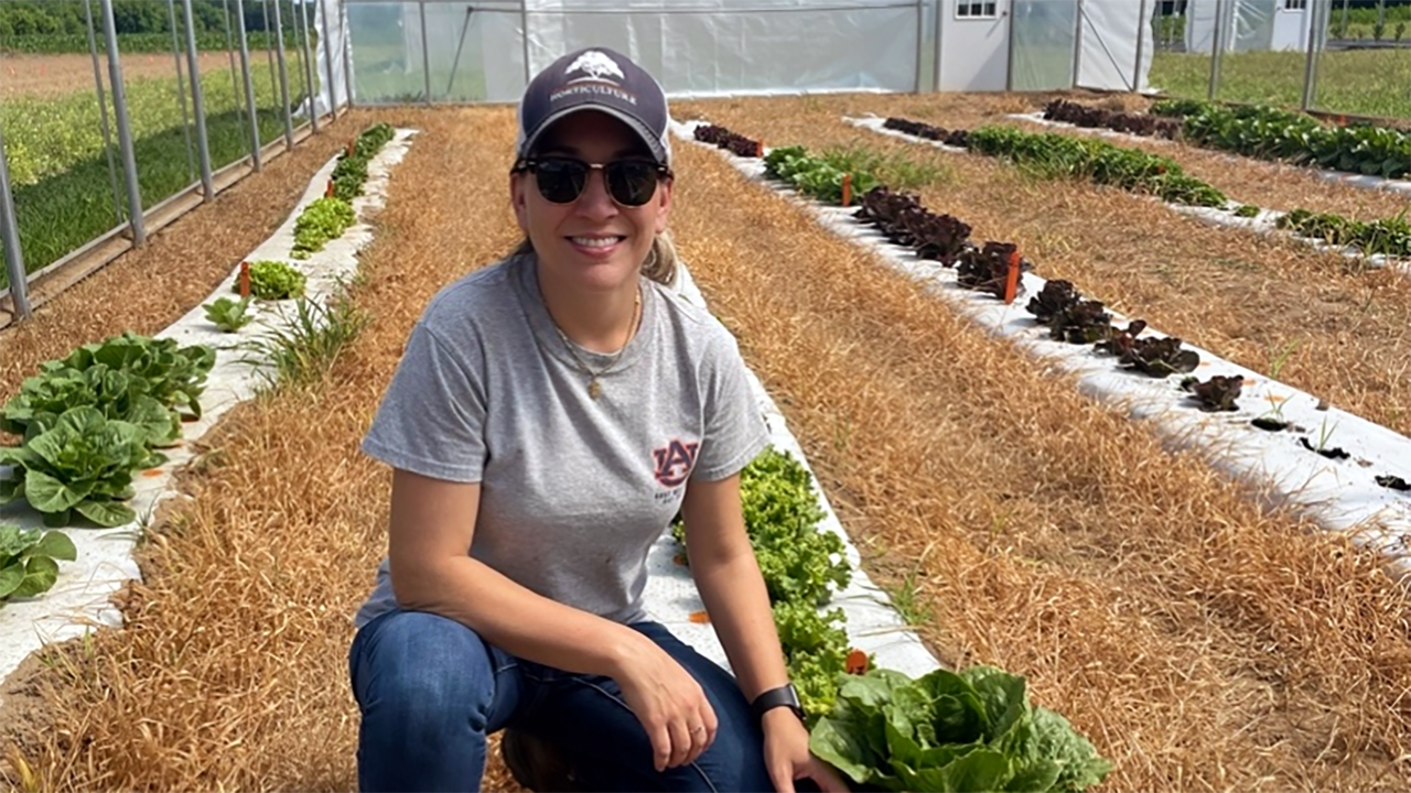 Camila-Rodrigues-with-produce-safety-lettuce-research-row-horticulture