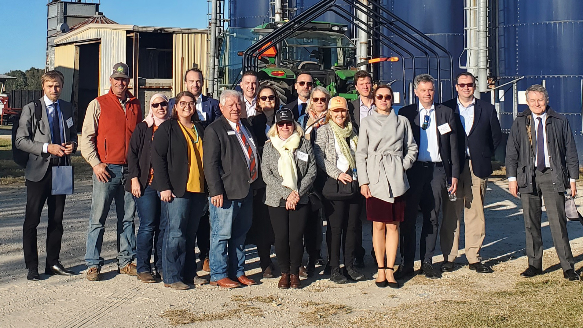 Representatives from 12 foreign embassies pose for a group photo with members of the Auburn University animal science faculty while on a farm tour in mid-October 2022