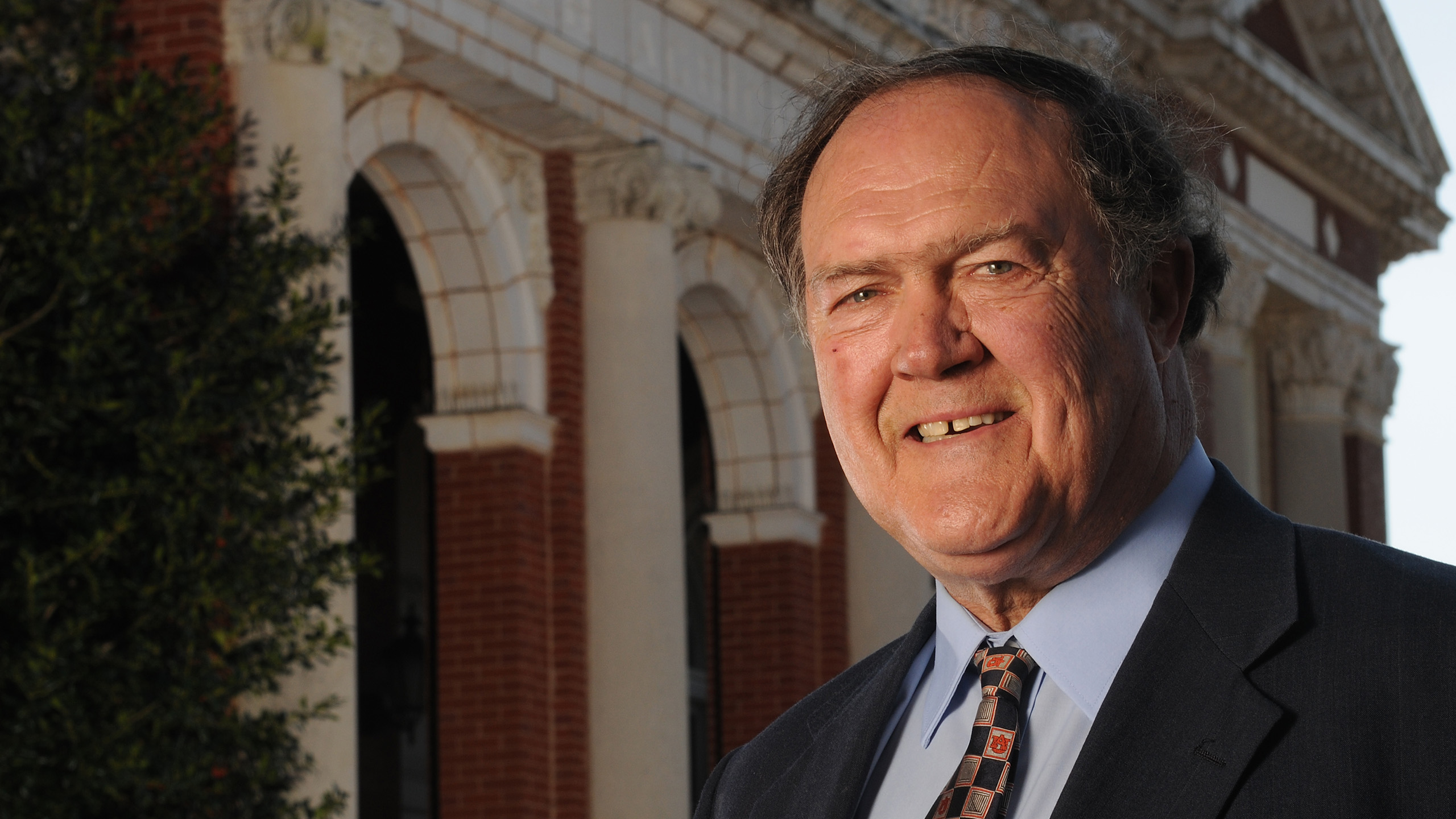Former Dean Richard Guthrie in front of Comer Hall