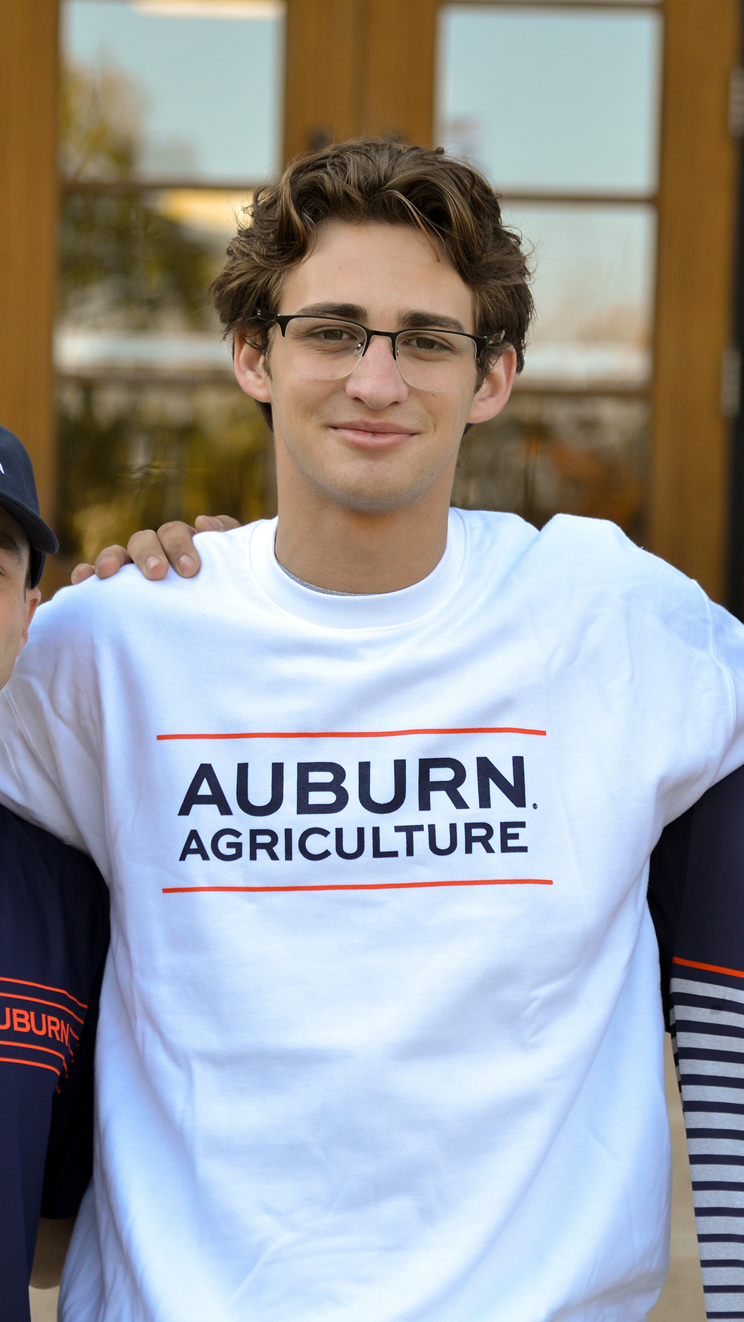 Auburn Ag White Sweatshirt Agriculture Store merch college young man wearing glasses brown hair