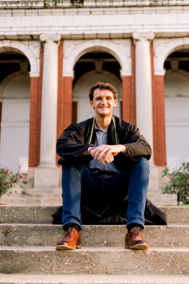 Photo of Tyler Martin sitting in front of Comer Hall, Auburn University, Alabama, USA.