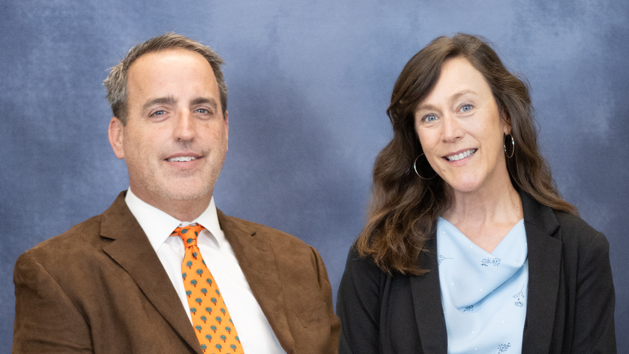 Studio portrait of Alumni Professors Ash Bullard and Eve Brantley