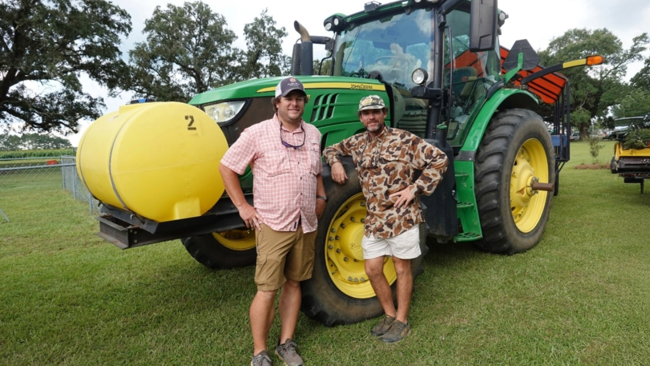 Employees with tractor